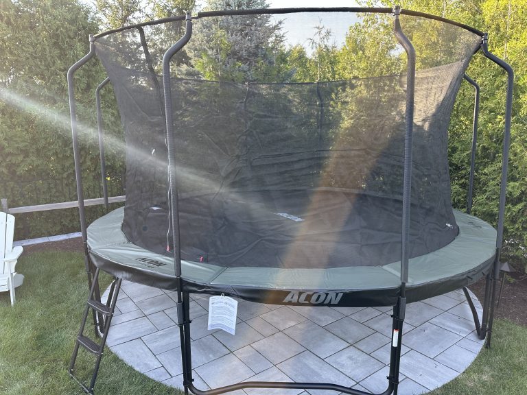 15-ft round trampoline assembly in yard