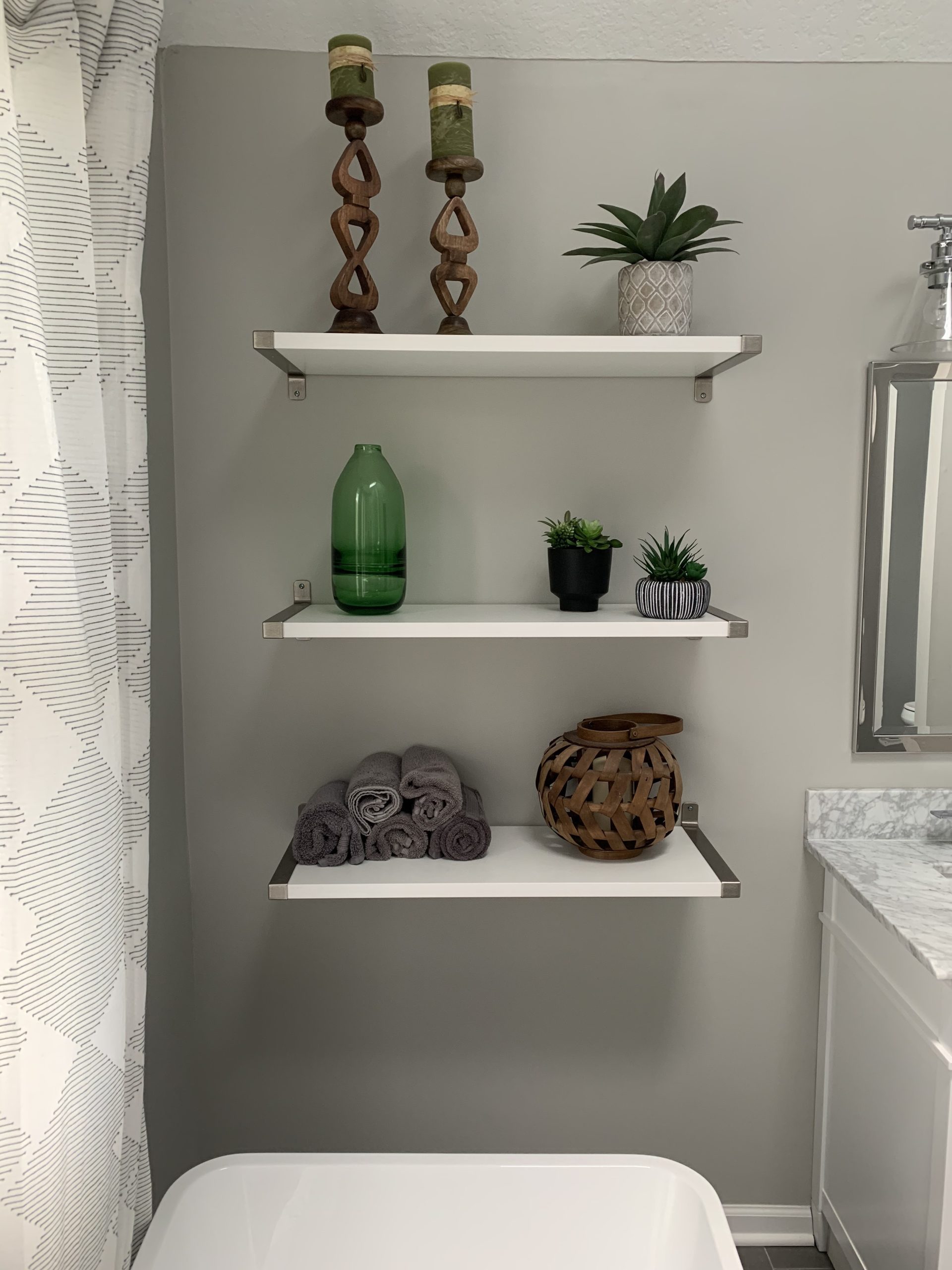 Three IKEA GRANHULT shelves with brackets and toggle bolts