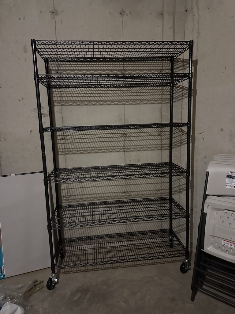 Assembly of wire shelving racks