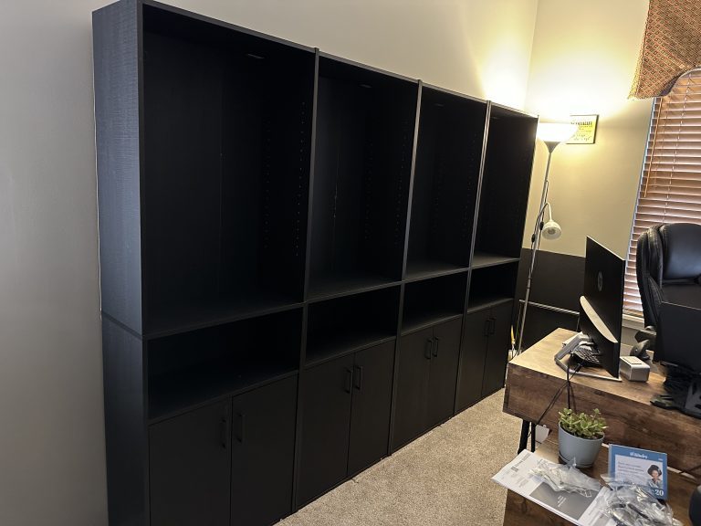 Assembly of four bookcases for home office