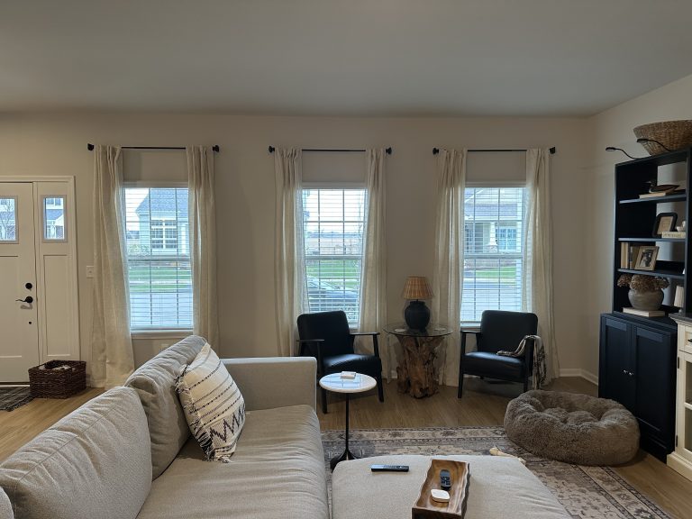 Mounting curtains throughout new construction home