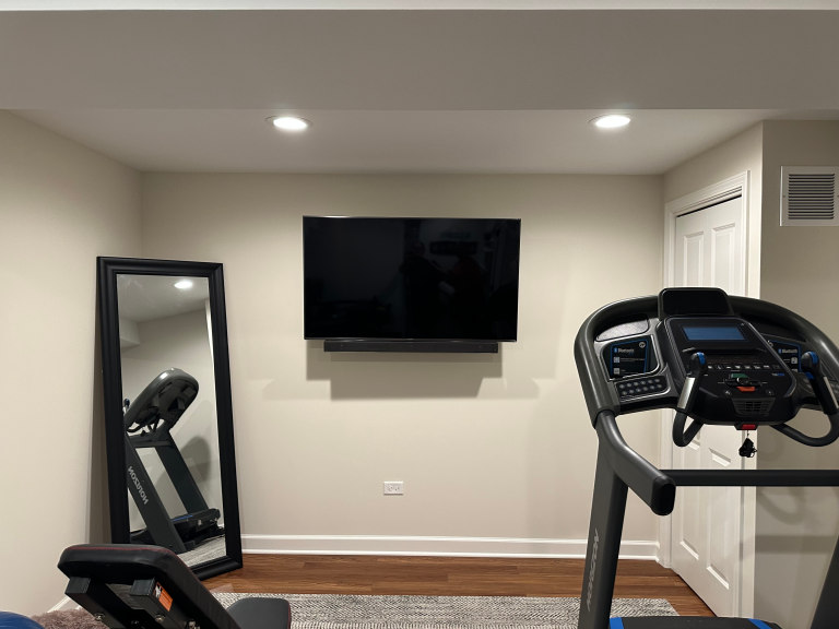 Mounting TVs for family room and home gym