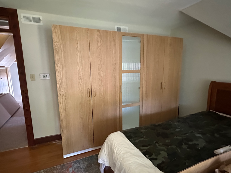 Assembly of PAX cabinets in vintage farmhouse