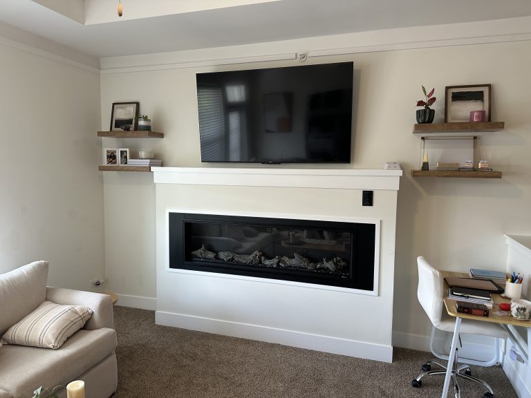 Mounting of 65″ TV over electric fireplace