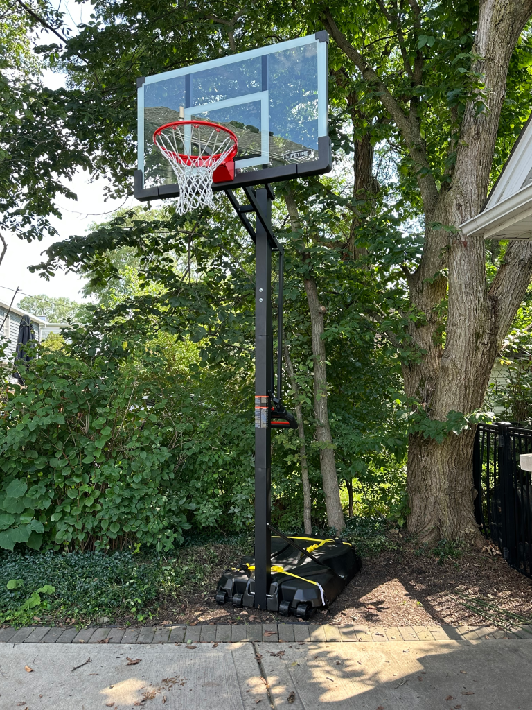 Assembly of Lifetime portable basketball hoop