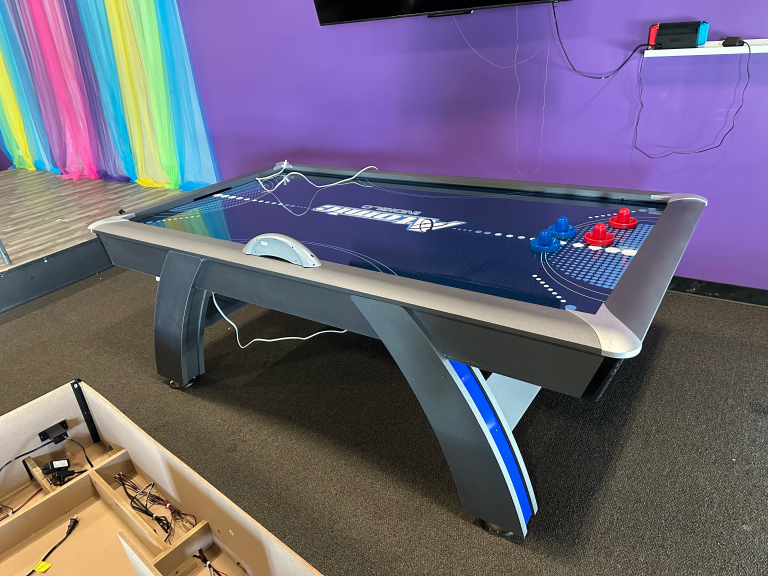 Commercial air hockey table assembly