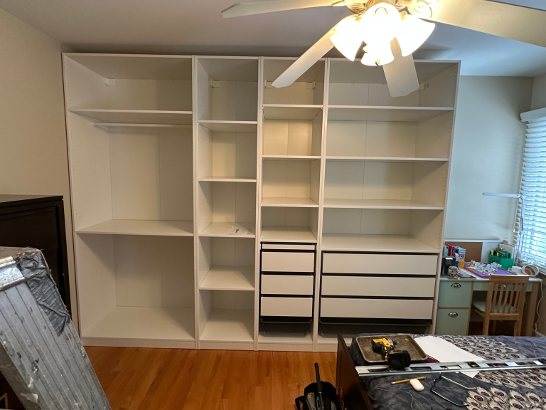 PAX closet system installation in bedroom