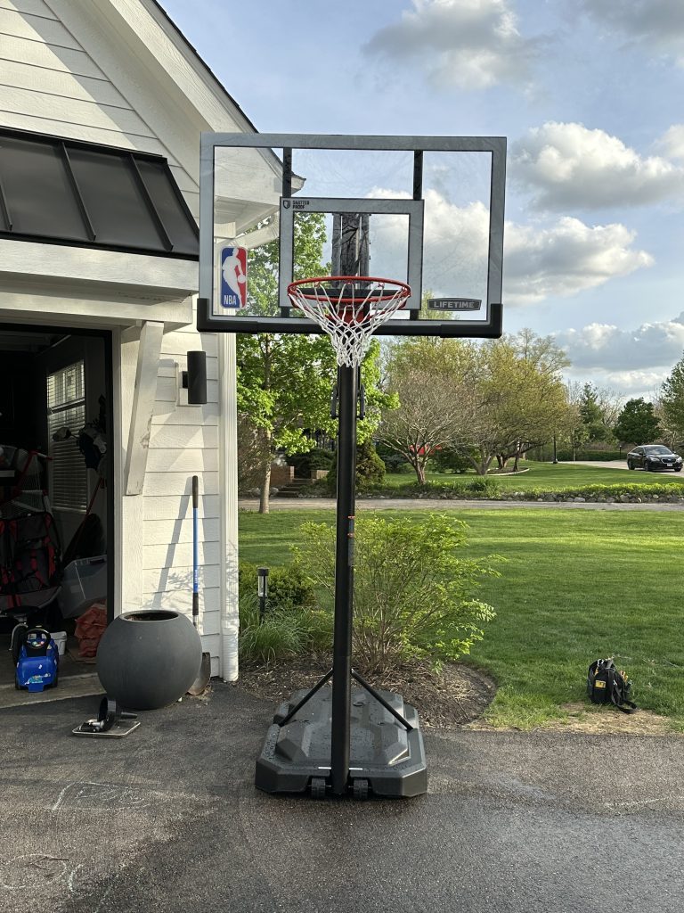 Portable basketball hoop assembly