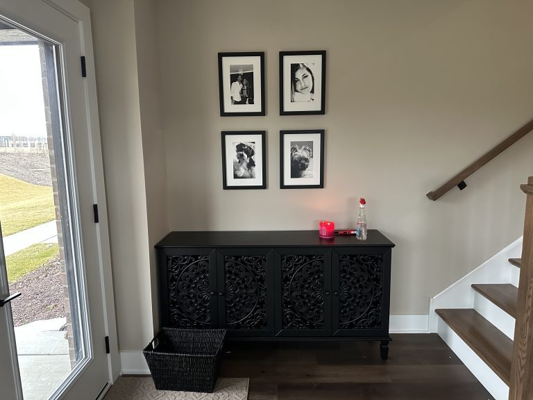 Mounting artwork throughout new home