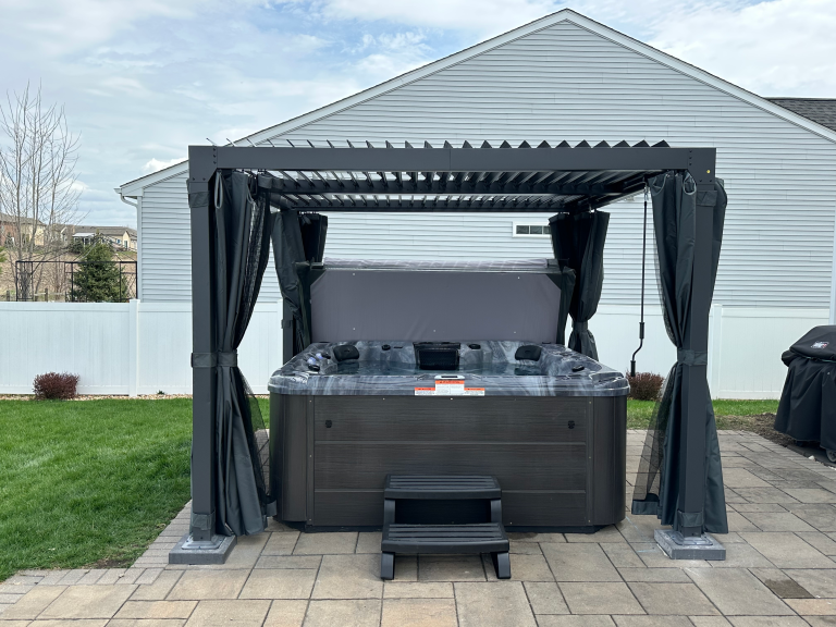 10×10 pergola assembly over hot tub
