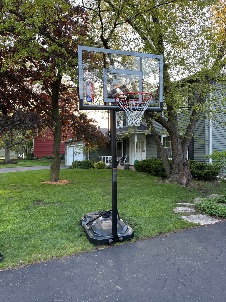 Assembly of portable basketball hoop