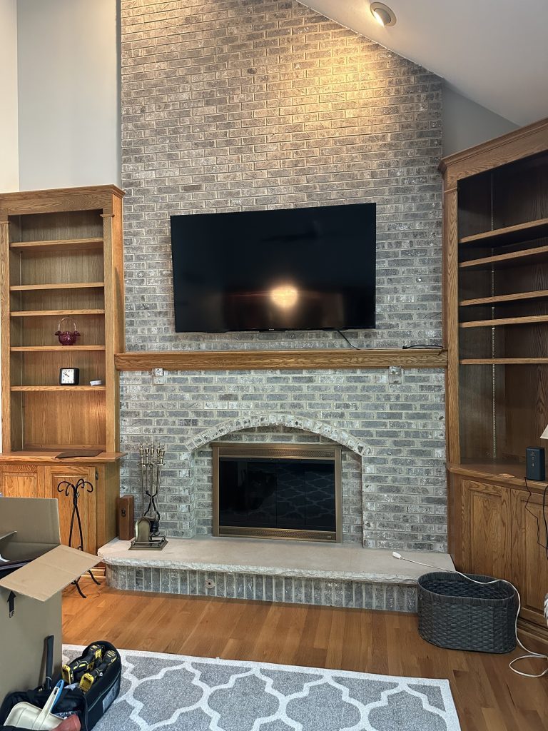 Mounting TV over fireplace in brick