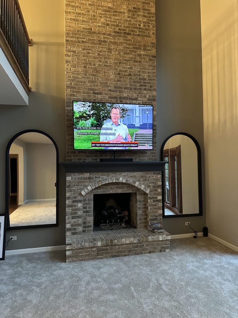 Installation of MantelMount and TV over brick fireplace